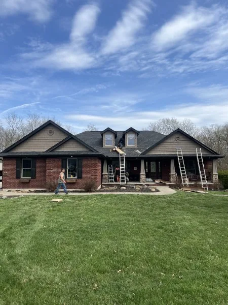 No Matter What Roofing & Siding crew installing a new asphalt shingle roof on a Greater Cincinnati home